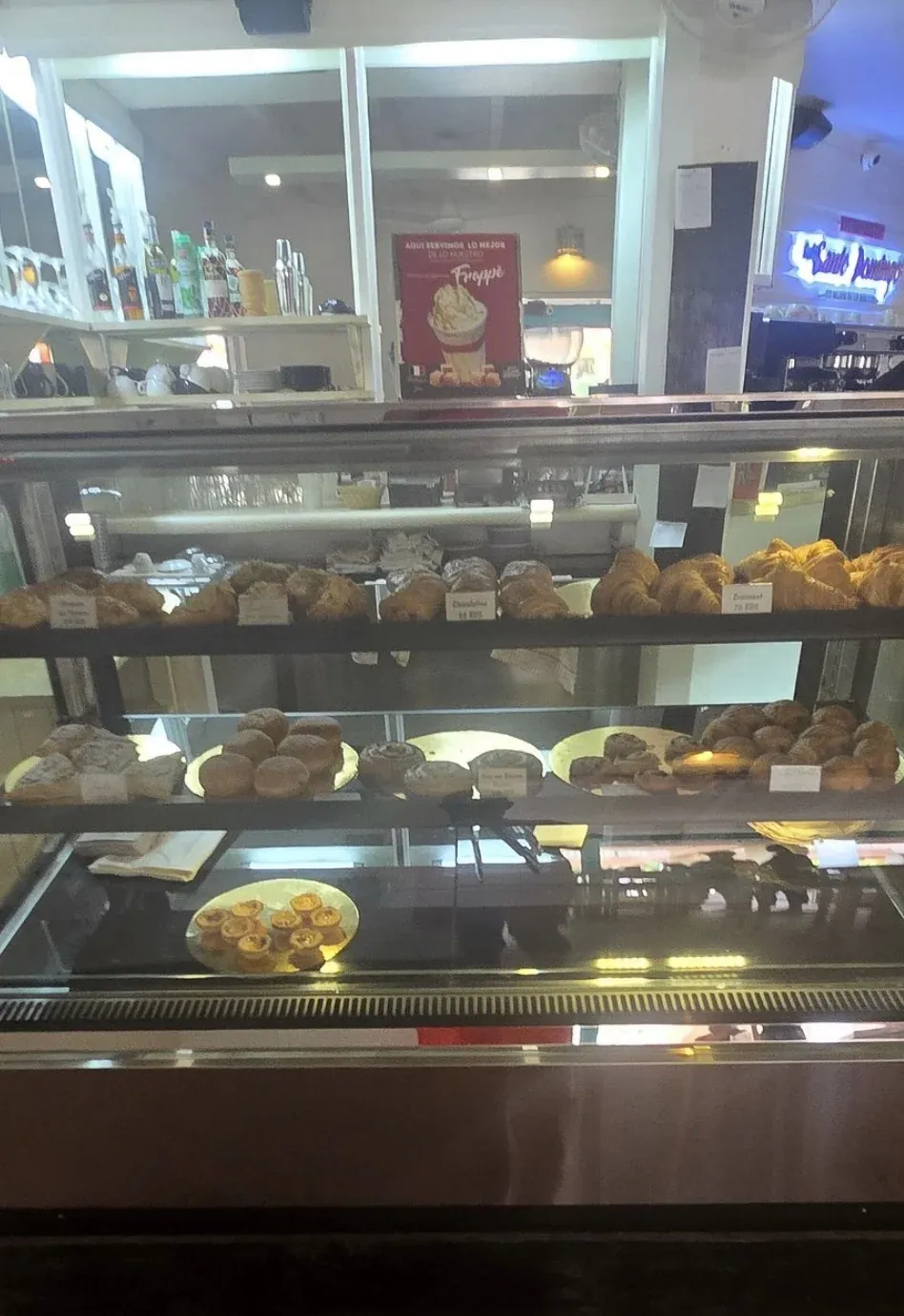 Boulangerie Jean's pastry case: croissants, pains au chocolat and pastries